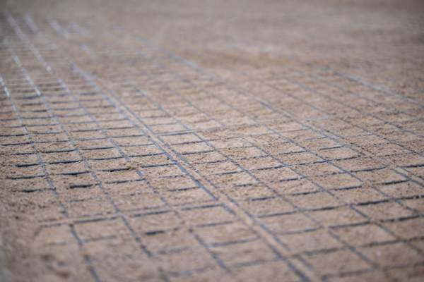 close up of infilled horse stall flooring